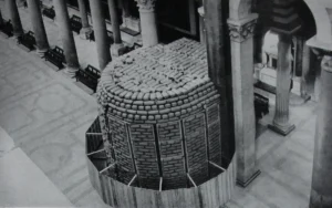 World War II historical photo of Giovanni Pisano's pulpit inside the Cathedral of Pisa, protected by protective sandbags and scaffolding against air raid bombings.